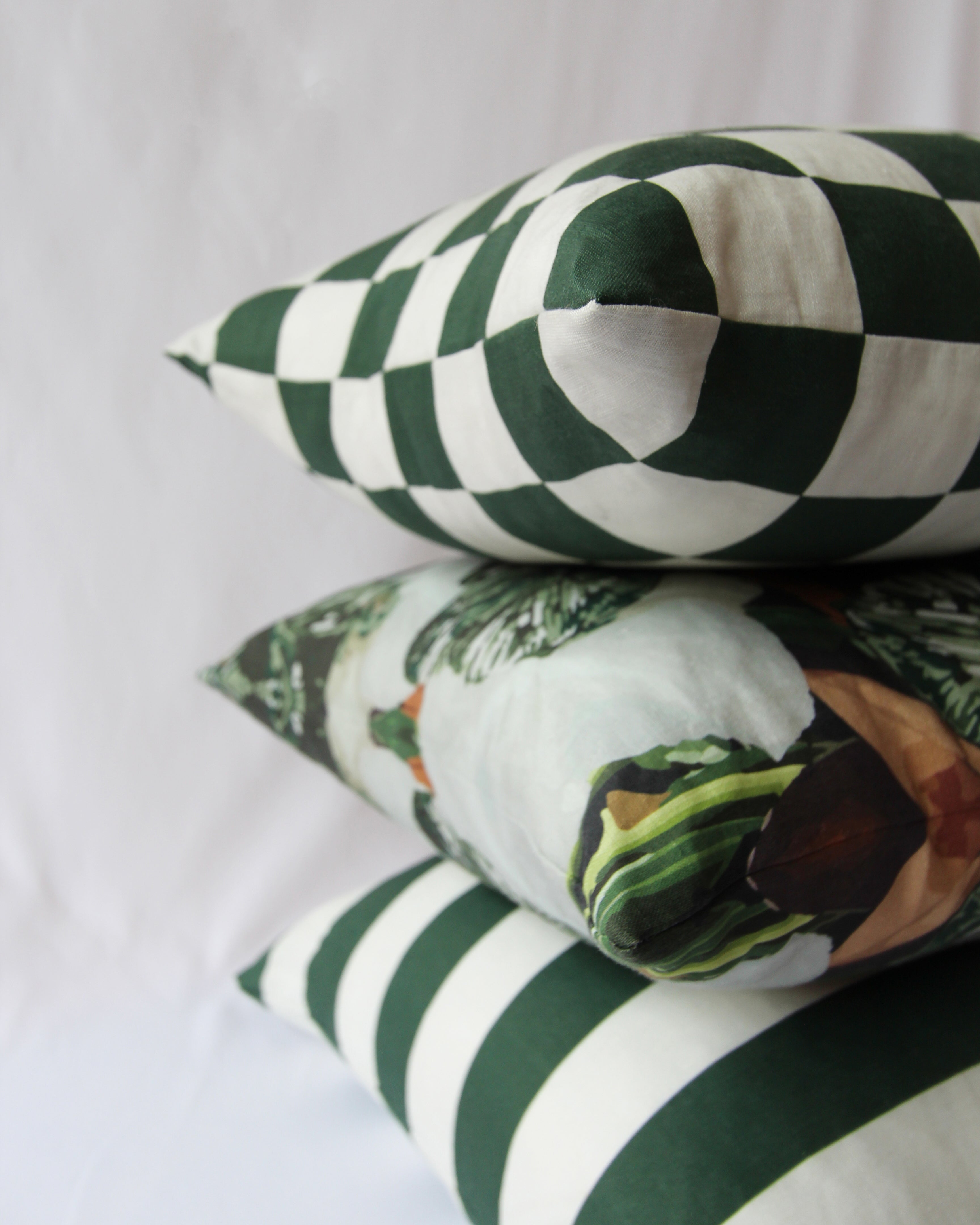 Thoughtfully styled green cushions