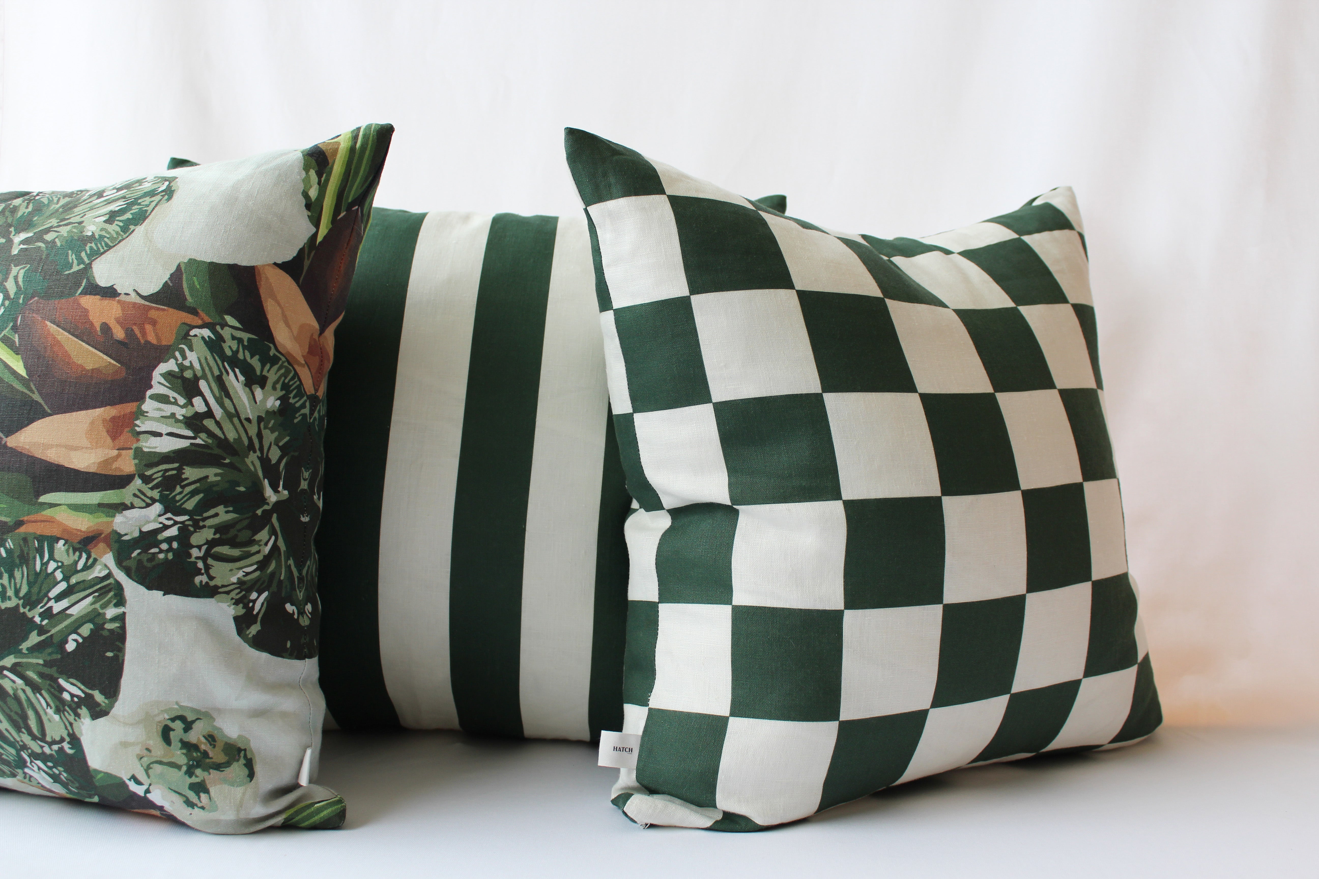 green and white floral cushion