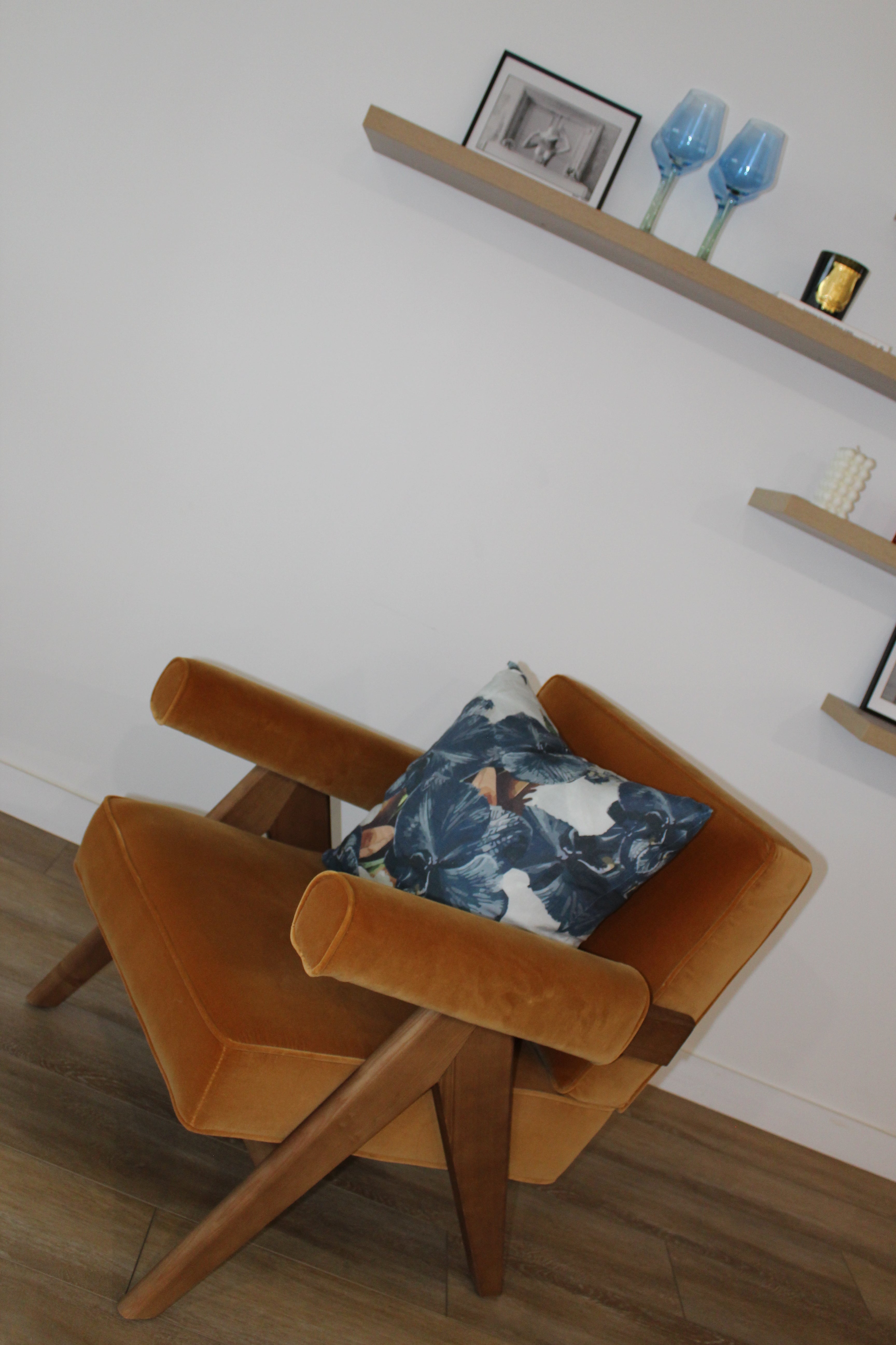 Navy slate floral premium linen cushion styled on a modern sofa