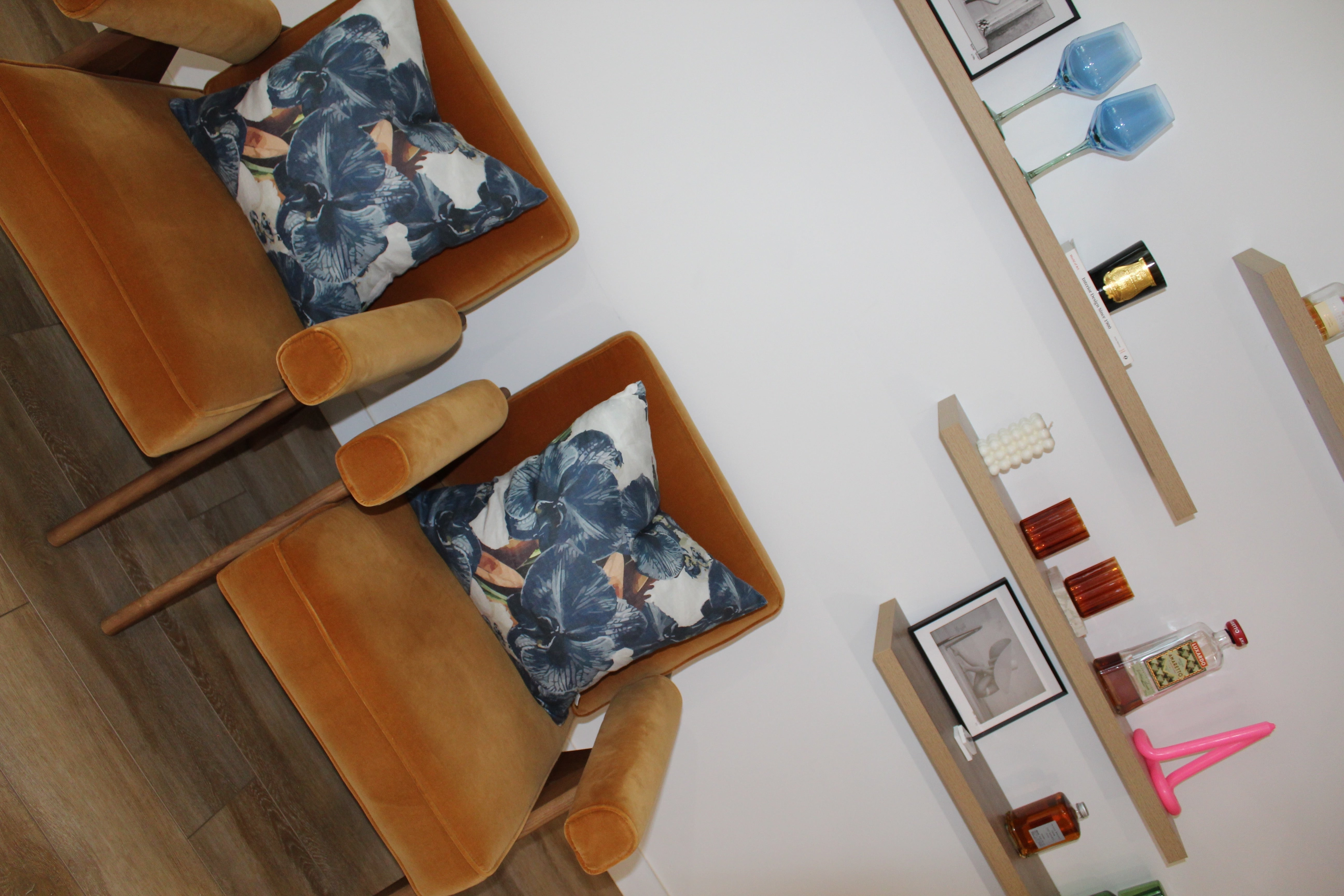 Set of navy slate hue linen cushions styled in minimalist living room