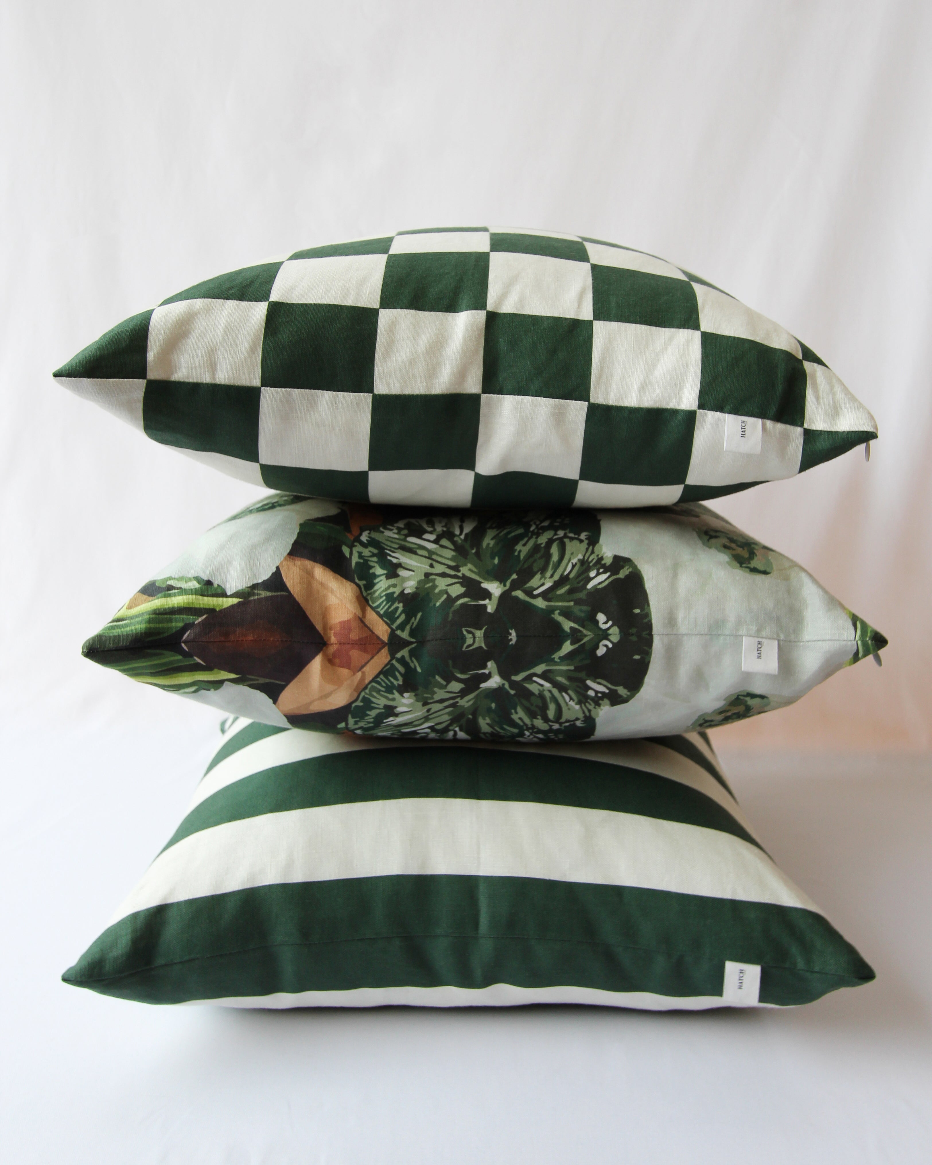 Pistachio green cushions styled as a trio