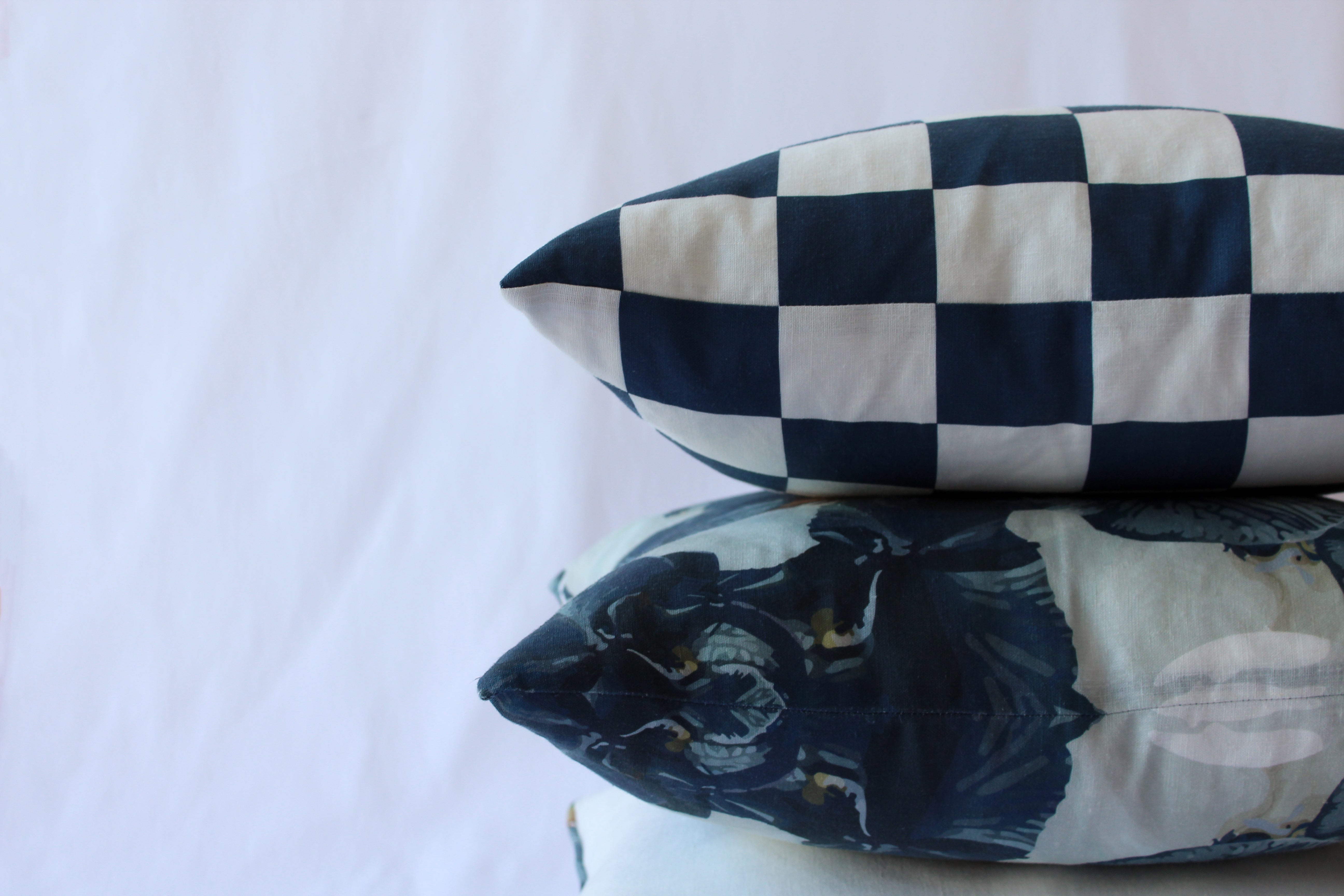 Luxury navy floral and checkered linen cushions