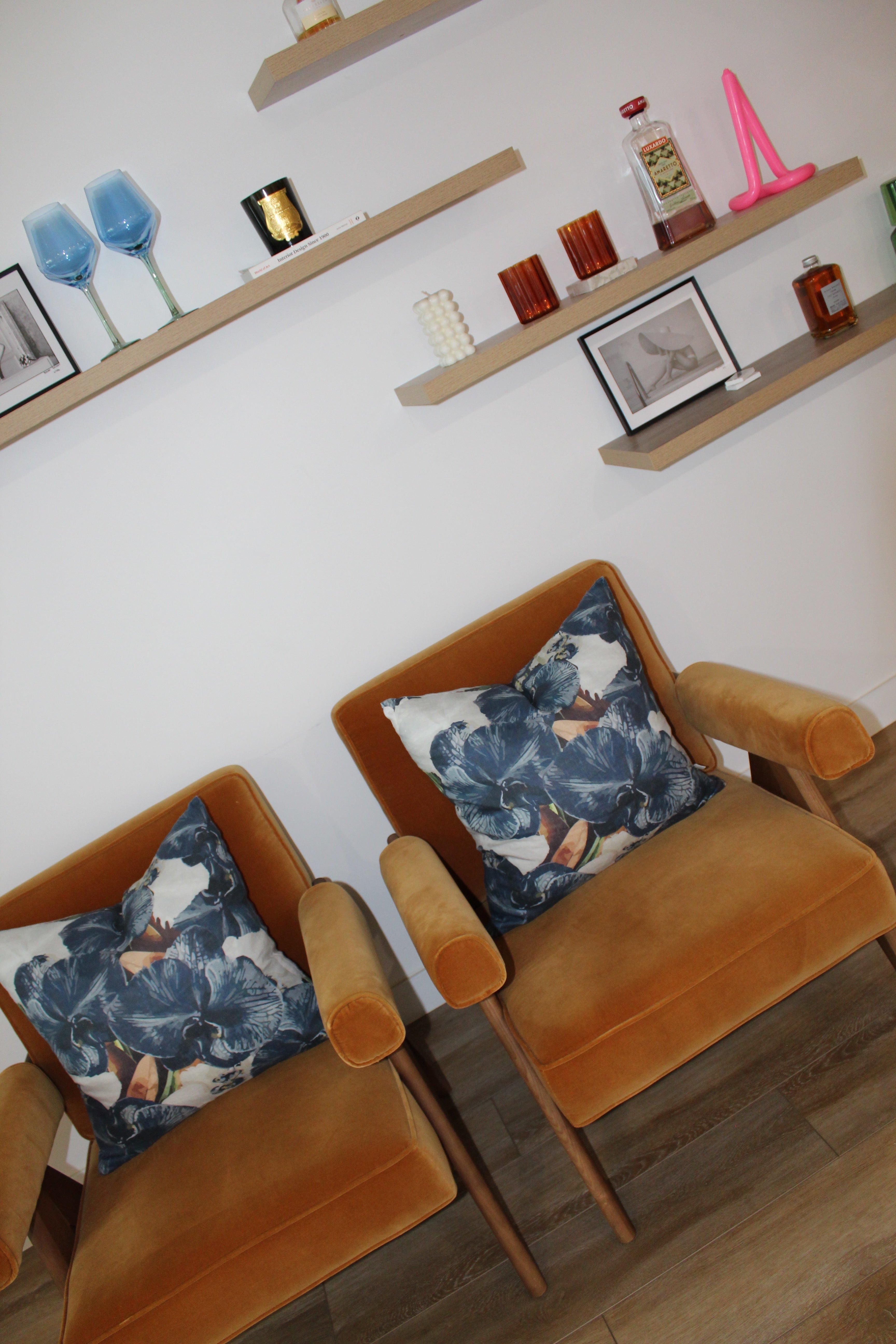 Navy slate limited edition linen cushions styled on velvet armchairs